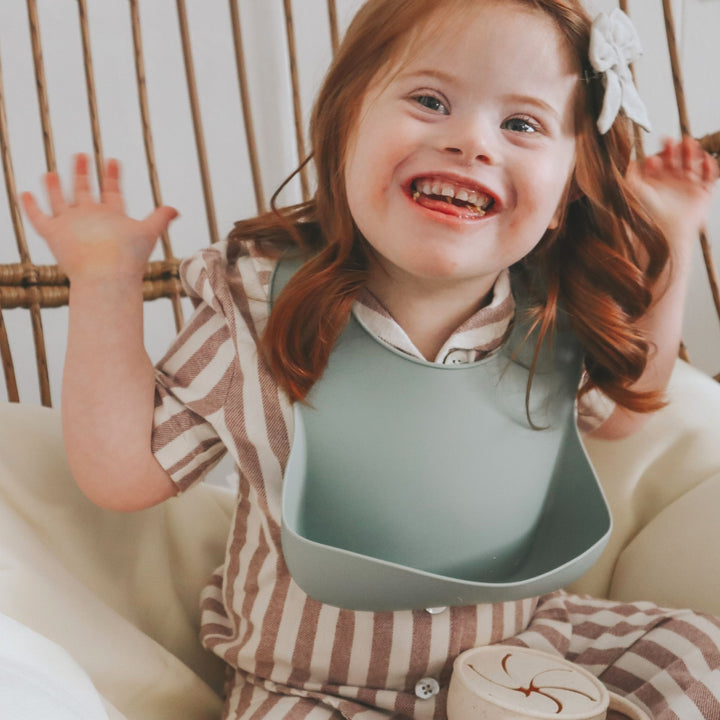 Silicone Bibs. From table to mouth, we crafted our dinnerware collection with you and your little one in mind, to ensure that they are able to enjoy their yummy foods while encouraging independent eating skills.